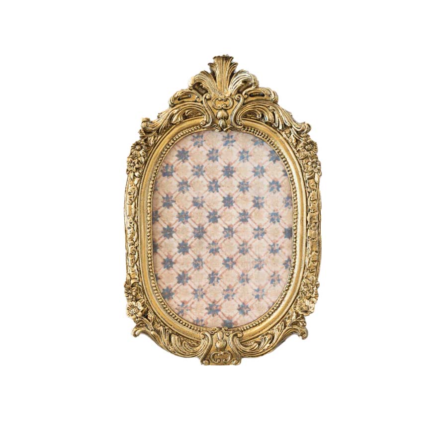 Decorative gold frame with a patterned interior on a white background