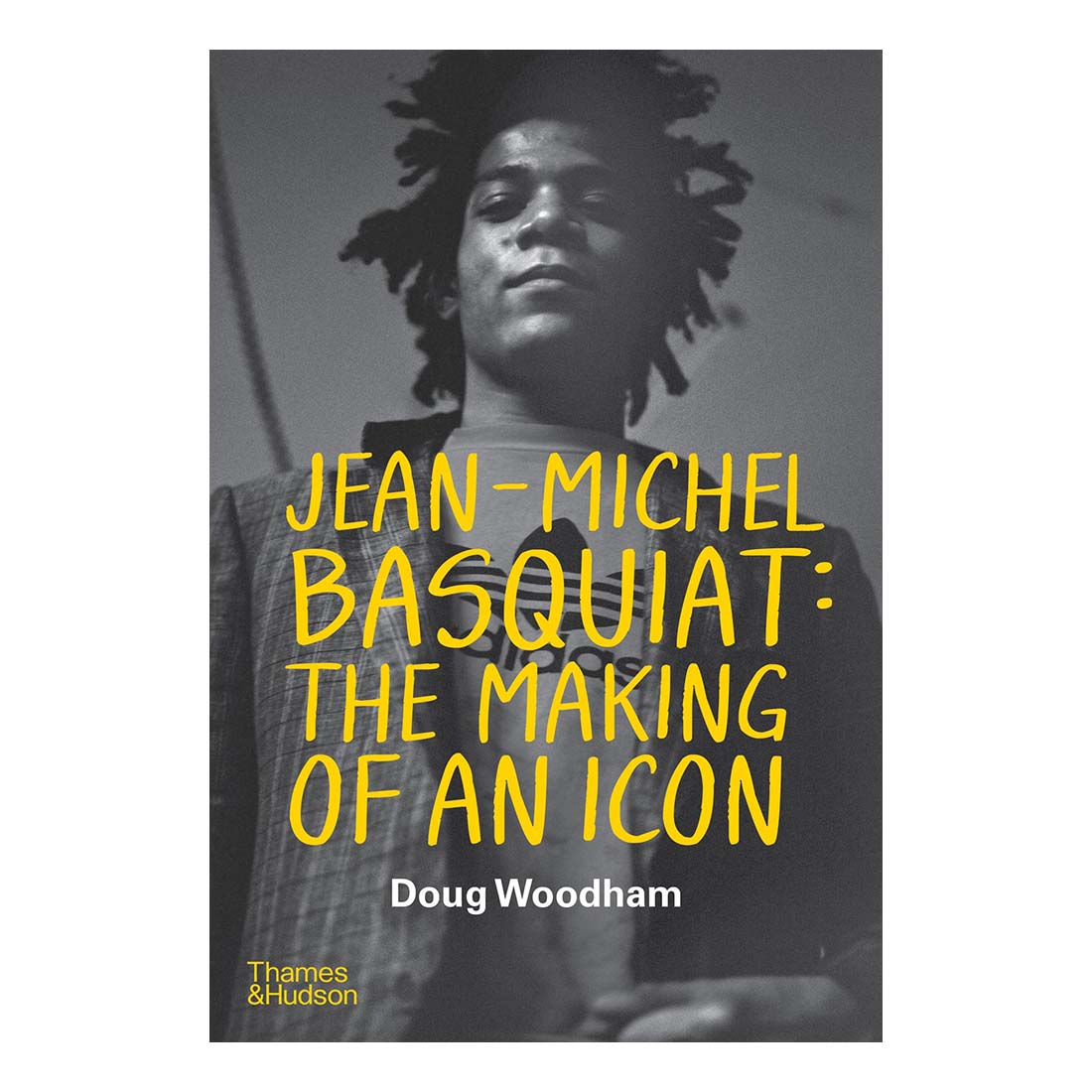 Book cover of 'Jean-Michel Basquiat: The Making of an Icon' with a black and white photo of a person and yellow text.