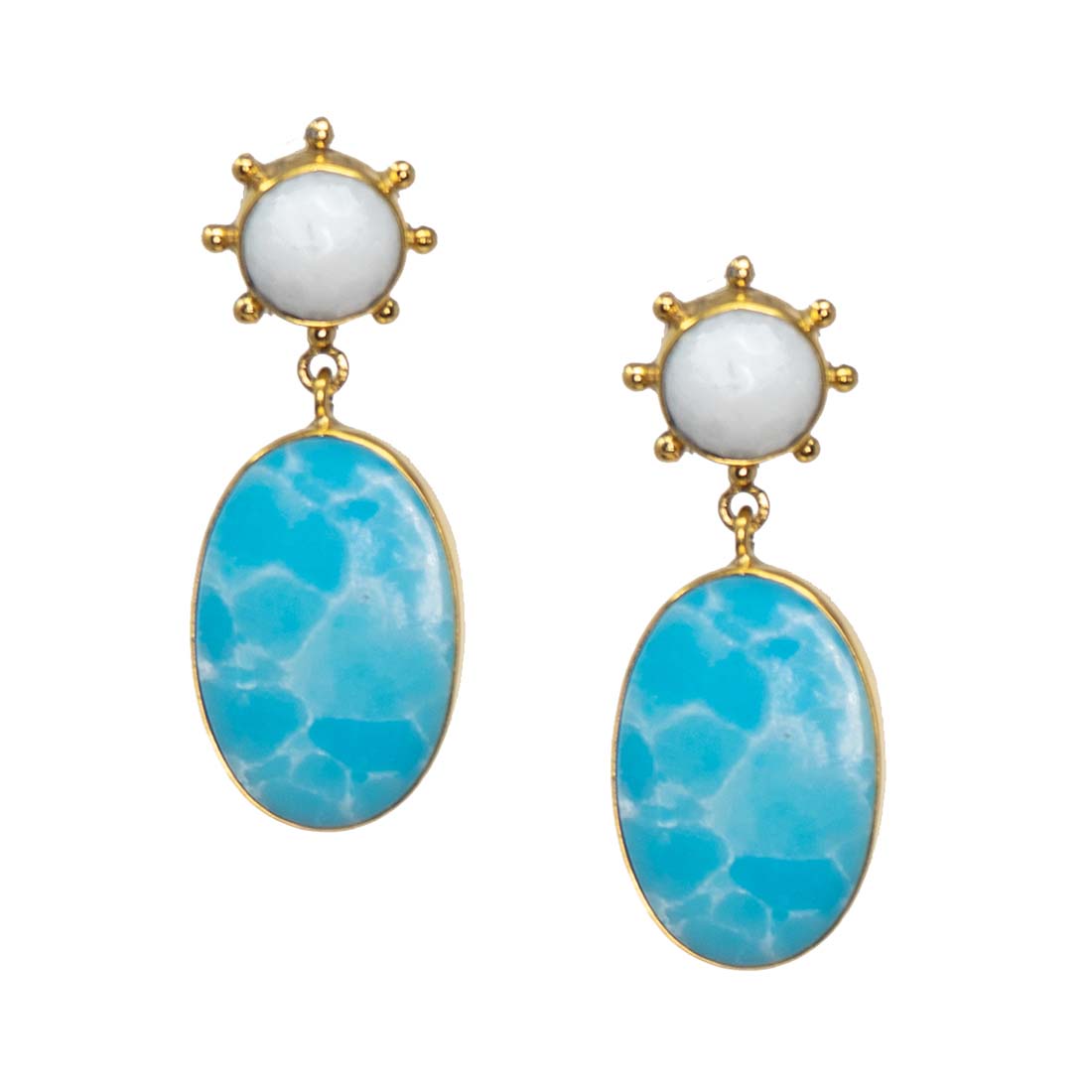 Pair of earrings with gold accents, white stones, and blue marbled drops on a white background