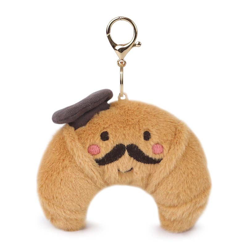Plush keychain shaped like a crescent moon with a mustache and top hat on a white background