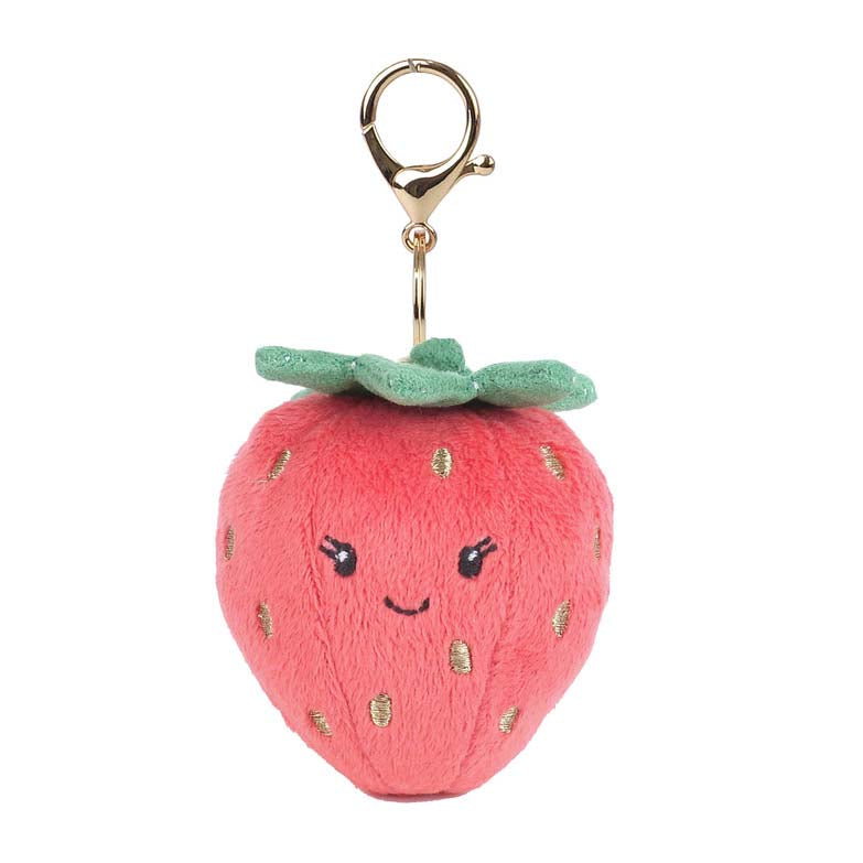 Plush strawberry keychain with a smiling face on a white background