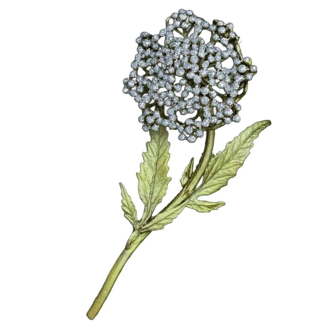 Brooch with diamond-studded flower and green leaves on a white background