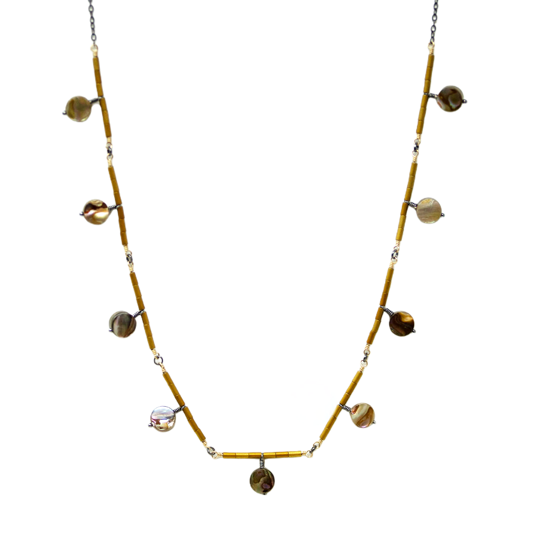 Necklace with gold and silver beads on a white background