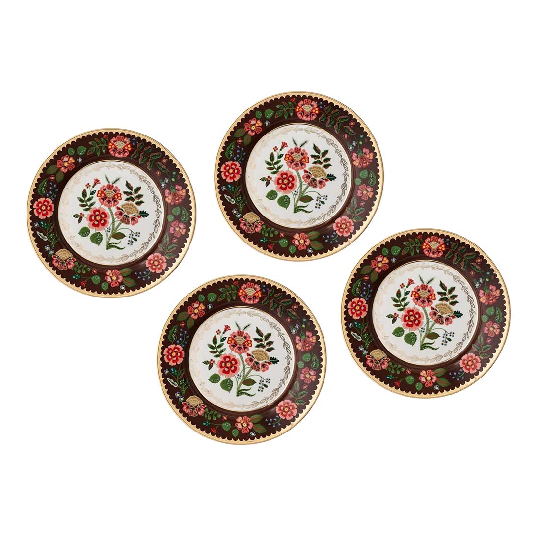 Set of four decorative plates with floral patterns on a white background