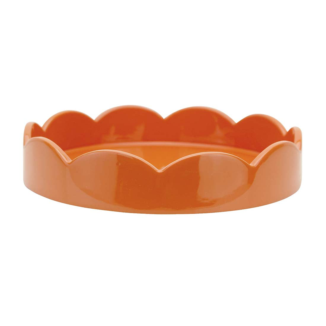 Orange scalloped-edge bowl on a white background