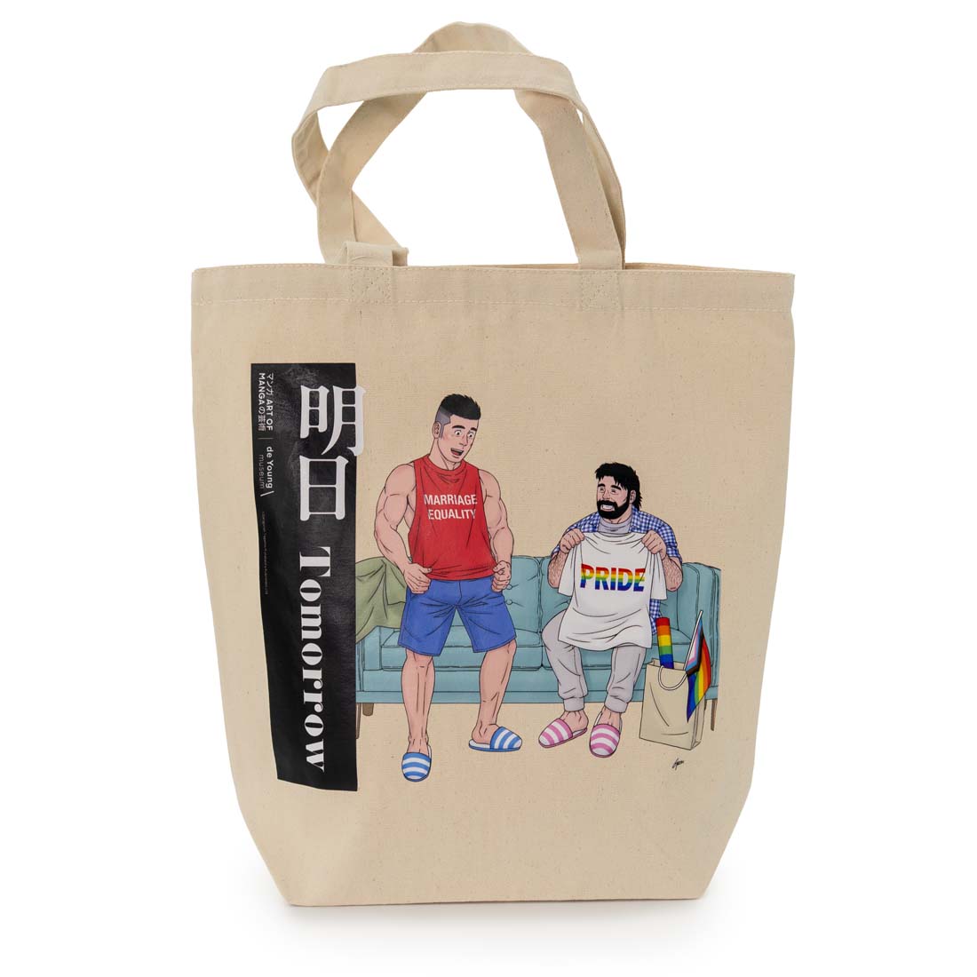 Beige tote bag with cartoon characters and text on a white background