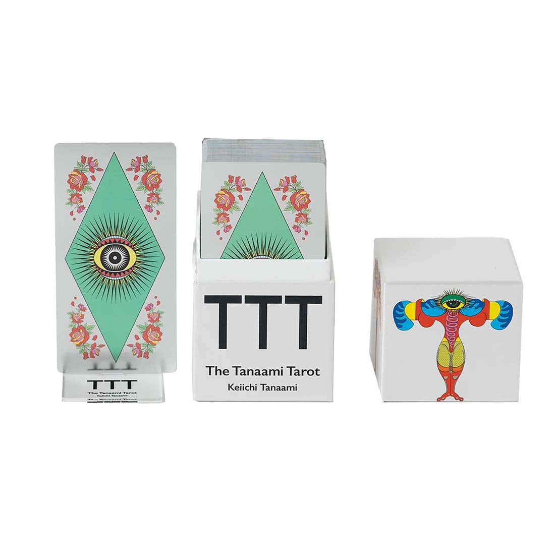 Three tarot card boxes with colorful designs on a white background