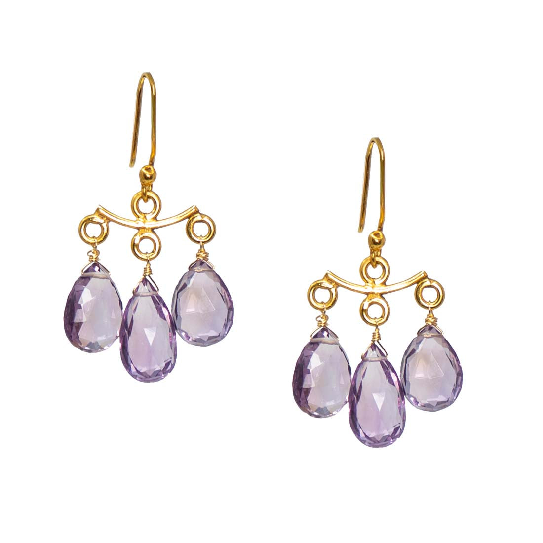 Pair of gold earrings with purple teardrop-shaped gemstones on a white background