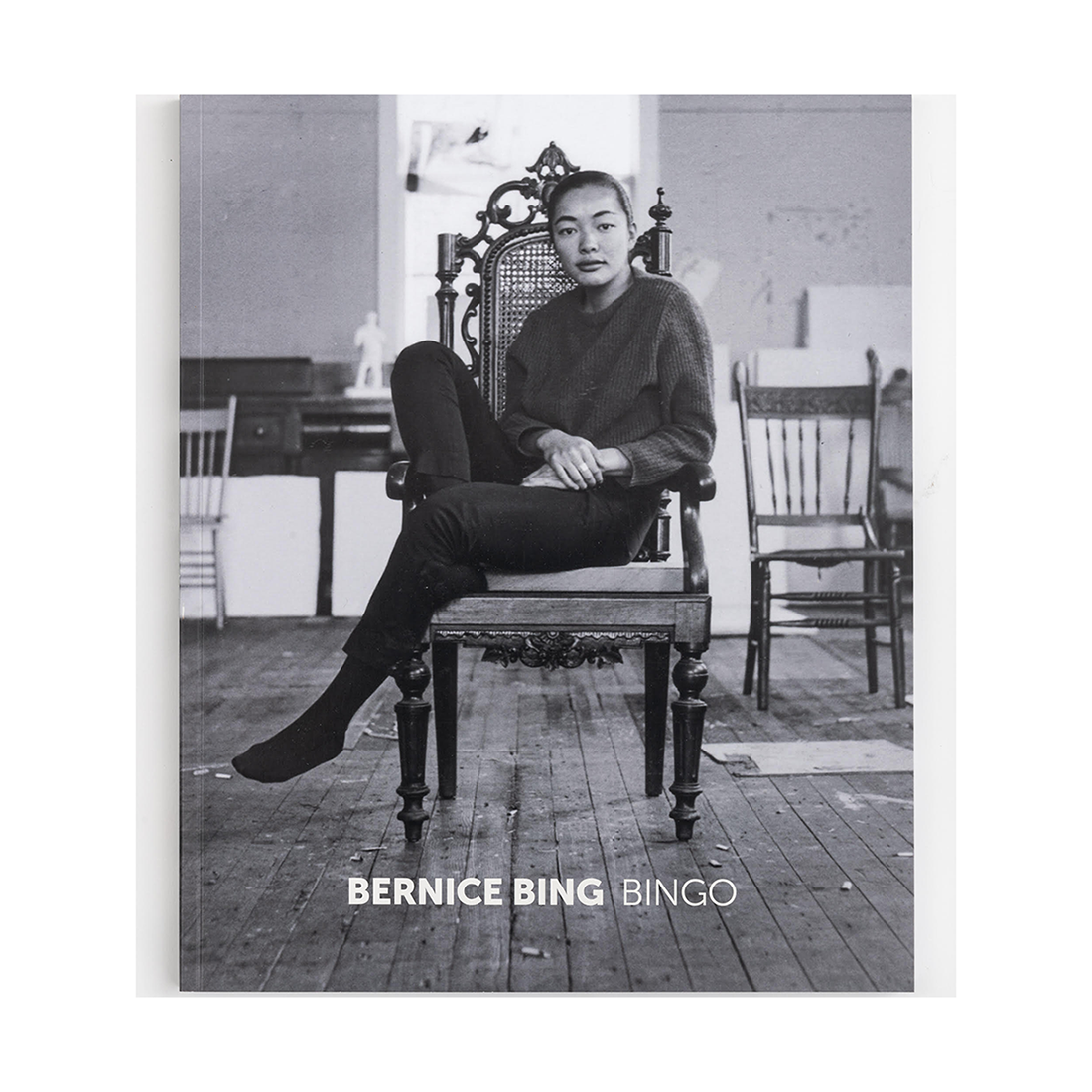 Black and white cover image of a book titled 'Bernice Bing: BINGO' featuring a monochrome photograph of an individual seated on a chair in an indoor setting.