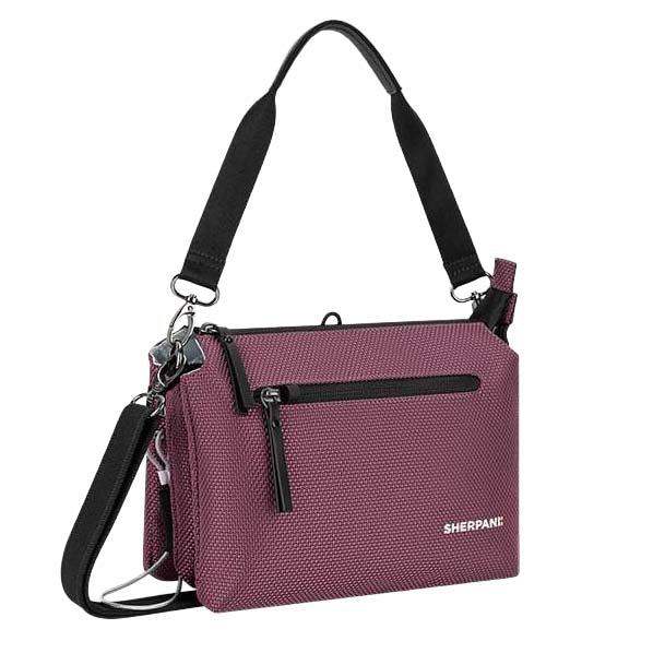 Purple crossbody bag with black straps on a white background