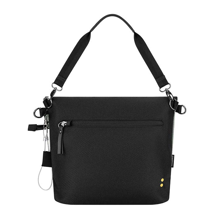 Green and black crossbody bag with Sherpani logo on a white background