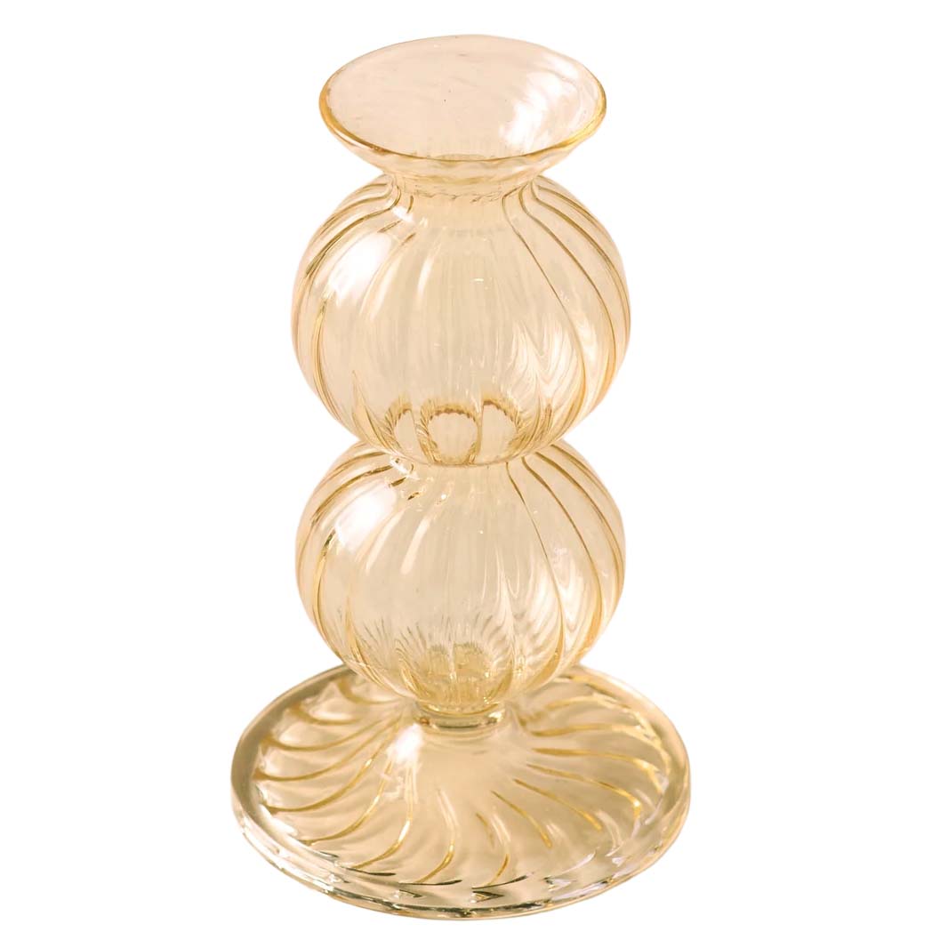 Gold glass candle holder on a white background