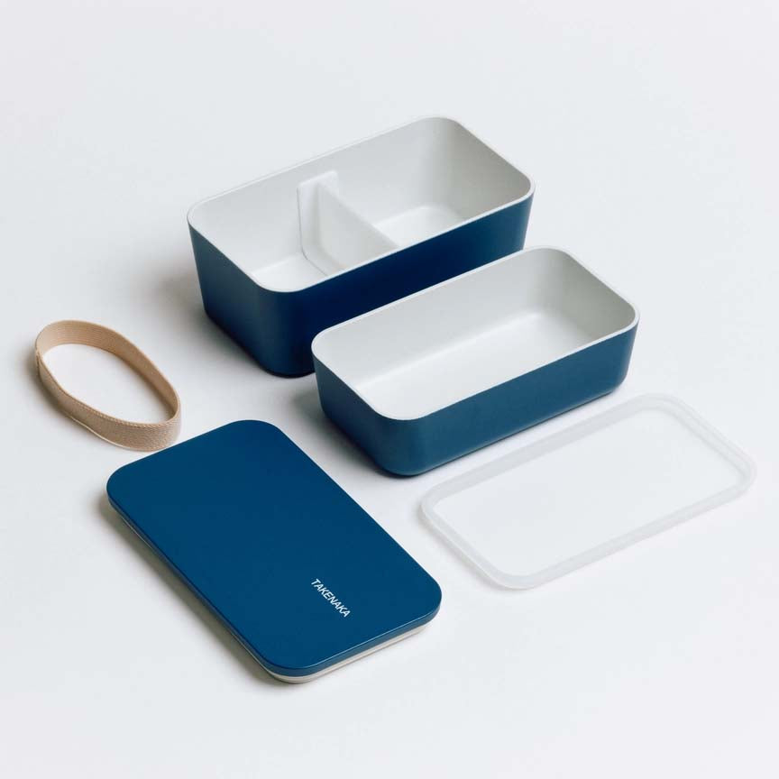 Blue bento box with 'TAKENAKA' branding on a white background