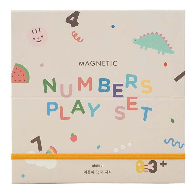 Box of a magnetic numbers play set with colorful text and illustrations on a beige background.
