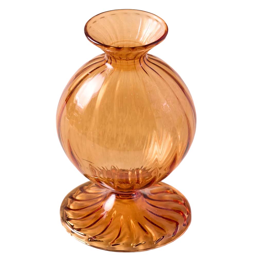 Amber glass vase with textured design on a white background