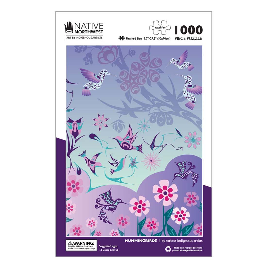 A 1000 piece jigsaw puzzle with a pattern of hummingbirds and flowers, predominantly in purple tones, packaging indicates it is an Indigenous Art puzzle made by Native Northwest.