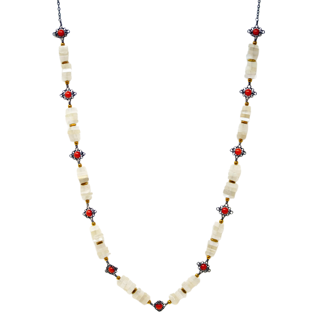 Necklace with white beads and red and gold accents on a white background