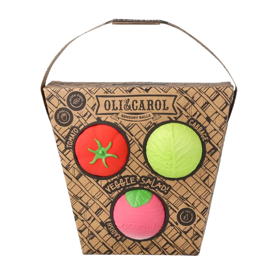 Oli & Carol sensory balls in a cardboard box on a white background