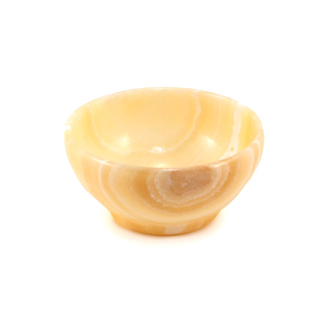 A beige alabaster bowl with a smooth, curved shape placed against a white background.